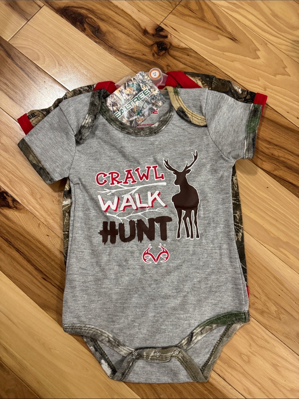 Realtree Camo Baby Bodysuit with Red Trim and Plaid Deer Graphic